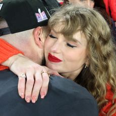 Travis Kelce #87 of the Kansas City Chiefs celebrates with Taylor Swift after a 17-10 victory against the Baltimore Ravens in the AFC Championship Game at M&T Bank Stadium on January 28, 2024 in Baltimore, Maryland. 