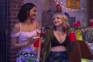 amrit kaur and mia rodgers in sex lives of college girls season 3 standing together at a college party