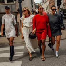 four guests attend the copenhagen spring summer 2025 fashion week shows 