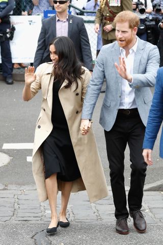 Prince Harry, Duke of Sussex and Meghan, Duchess of Sussex greet members of the public on October 18, 2018 in Melbourne, Australia. The Duke and Duchess of Sussex are on their official 16-day Autumn tour visiting cities in Australia, Fiji, Tonga and New Zealand.