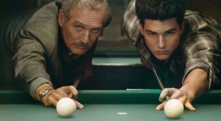 paul newman and tom cruise line up the white ball while playing pool in the color of money