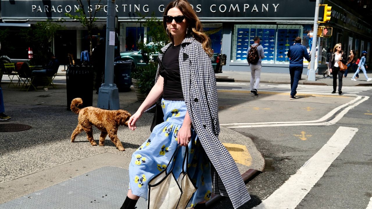 Designer Tanya Taylor in a printed skirt and a houndstooth coat