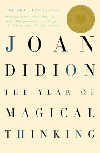 The Year of Magical Thinking book cover with the title in blue and black letters and tan backdrop