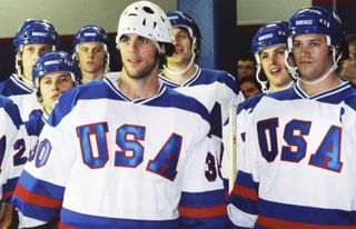 hockey players wearing team usa jerseys on the ice rink in the movie miracle