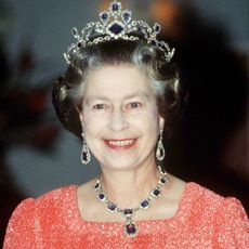 Queen Elizabeth wears the $6 million George VI sapphire necklace and matching earrings she received from her father for her wedding