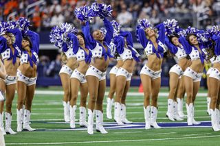 the Dallas Cowboys cheerleaders performing at the cowboys bengals game as Armani Latimer chooses not to wear a wig