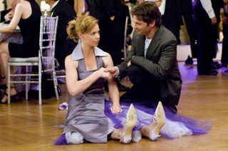 kathryn heigl sits on the floor in a bridesmaids dress next to james marsden in 27 dresses