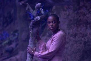 Jennifer Kale (Sasheer Zamata), holding her broom on the Witches' Road, in Marvel Television's AGATHA ALL ALONG, exclusively on Disney+.