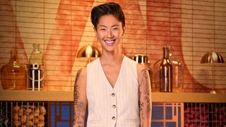 kristen kish poses in a promo shot for top chef