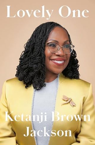 Lovely One book cover with a photo of ketanji brown jackson in a yellow suit smiling