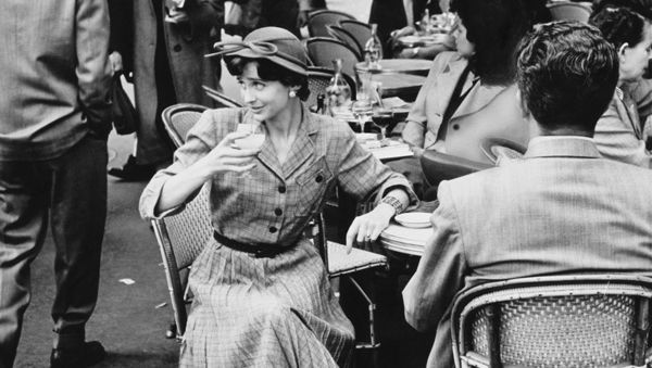 Monochrome, Hat, Photograph, Mammal, Style, Black-and-white, Chair, Monochrome photography, Crowd, Sun hat, 