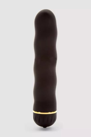 black vibrator on a gray background