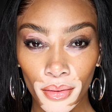 winnie harlow wearing a tubing mascara