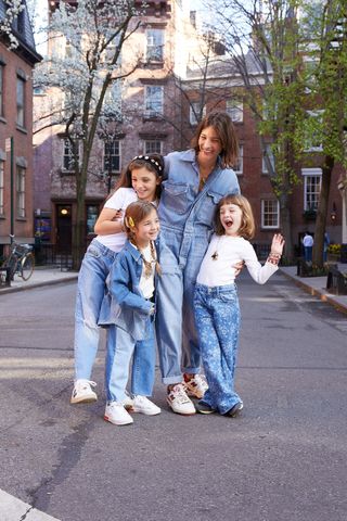 Maria Duenas Jacobs with her three girls