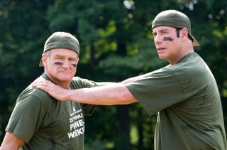 robin williams and john travolta playing a field day game in the movie Old dogs