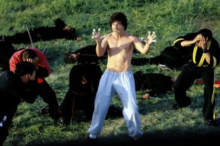 a kung fu master in white pants with eye balls on his fingers having defeating other fighters in the movie Kung pow enter the fist