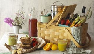 Picnic Basket with Food and Flowers