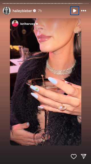 Hailey Bieber wearing a martini manicure