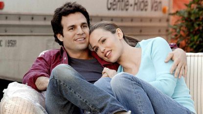 mark ruffalo and jennifer garner sit on a couch after moving in 13 going on 30