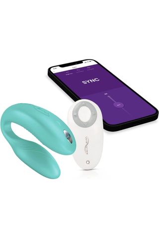 app-controlled vibrator for couples, in light blue beside a phone and a remote control on a white background