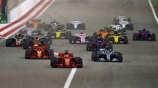  Sebastian Vettel of Germany driving the (5) Scuderia Ferrari SF71H leads Kimi Raikkonen of Finland driving the (7) Scuderia Ferrari SF71H, Valtteri Bottas driving the (77) Mercedes AMG Petronas F1 Team Mercedes WO9 and the rest of the field at the start during the Bahrain Formula One Grand Prix at Bahrain International Circuit on April 8, 2018