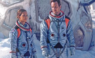 haley berry and patrick wilson in space suits on a snowy moon in the movie Moon fall