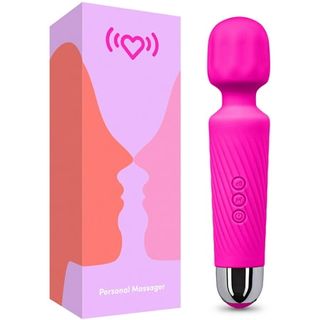 pink wand vibrator beside its box on a white background