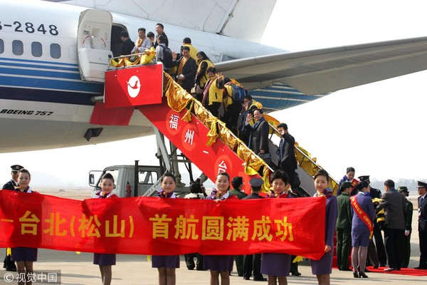 ▲福州：大三通兩岸空運直航直飛儀式舉行 全體空姐身著旗袍亮相。（圖／視覺中國）