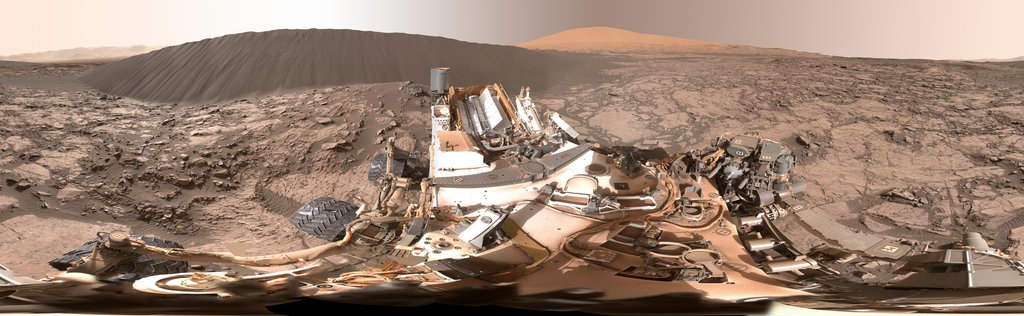 This view from NASA's Curiosity rover of the downwind face of 'Namib Dune' on Mars covers 360 degrees, including a portion of Mount Sharp on the horizon. The site is part of the dark-sand 'Bagnold Dunes' field along the northwestern flank of Mount Sharp.