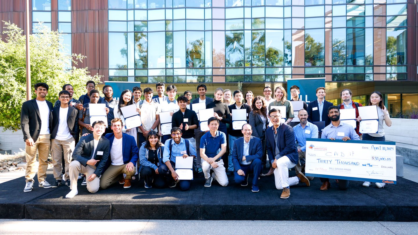 Student finalists in the Bill Gross Business Plan Competition pose with Bill Gross (first row, fourth from right) and leaders from Sunstone-ALC, Richard Jun (first row, third from right) and Zhen Wang (first row, fifth from right).