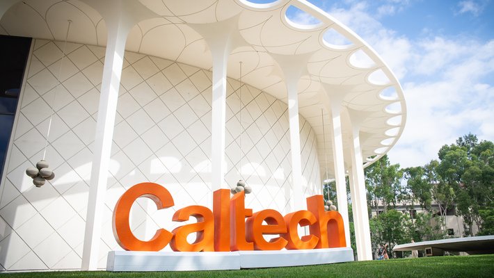 Exterior Beckman Auditorium with Caltech logo block letter sign