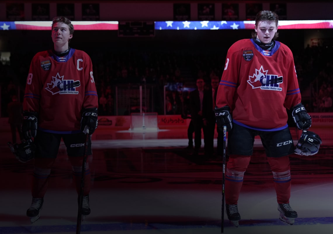 Hockey Players Standing in Rink