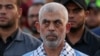 (FILES) Head of the political wing of the Palestinian Hamas movement in the Gaza Strip Yahya Sinwar attends a rally in support of Jerusalem's al-Aqsa mosque in Gaza City on October 1, 2022.