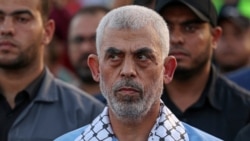 (FILES) Head of the political wing of the Palestinian Hamas movement in the Gaza Strip Yahya Sinwar attends a rally in support of Jerusalem's al-Aqsa mosque in Gaza City on October 1, 2022.