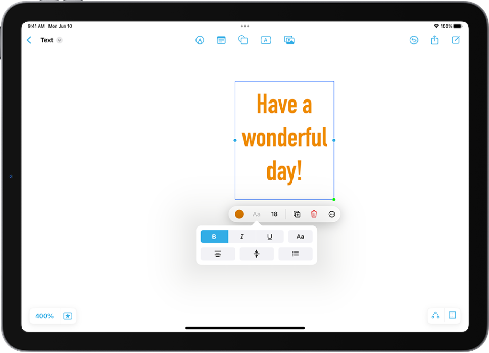 Una pissarra de l'app Freeform mostra un quadre de text seleccionat i, a sobre, les eines de format de text.