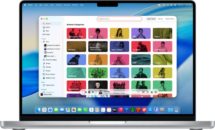La ventana de Apple Music mostrando el campo de búsqueda y los mosaicos de categorías.