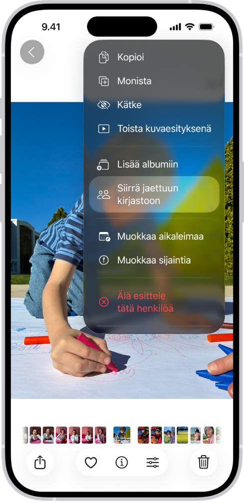 Kuvat-apissa on auki kuva. Näytön yläreunassa on valinta Siirrä jaettuun kirjastoon.
