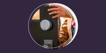 hand opening door with august smart lock on it