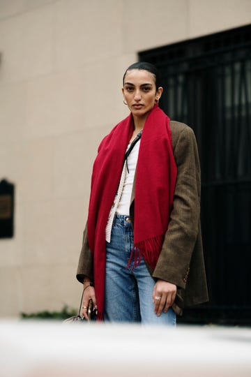 a woman in a red coat