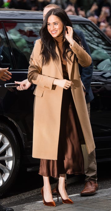 meghan markle wears a camel coat at a royal appearance in a guide to the best camel coats