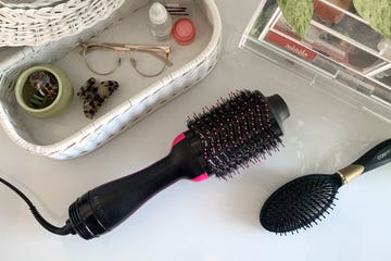 revlon hot brush on vanity with claw clips and makeup