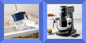 a person filling up a larq self cleaning uv water filter pitcher, ge profile smart mixer with auto sense on a countertop