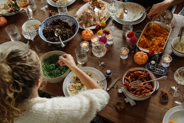 person sitting at thanksgiving table