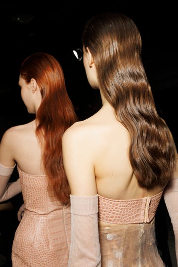 milan, italy february 24 models, hair detail, are seen backstage ahead of the ermanno scervino fashion show during the milan fashion week womenswear fallwinter 2024 2025 on february 24, 2024 in milan, italy photo by rosdiana ciaravologetty images