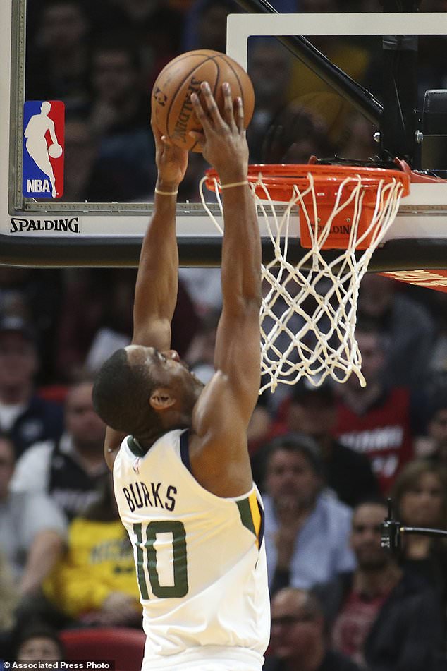 Utah Jazz guard Alec Burks (10) goes to the basket against the Miami Heat during the first half of an NBA basketball game, Sunday, Jan. 7, 2018, in Miami. (AP Photo/Joel Auerbach)