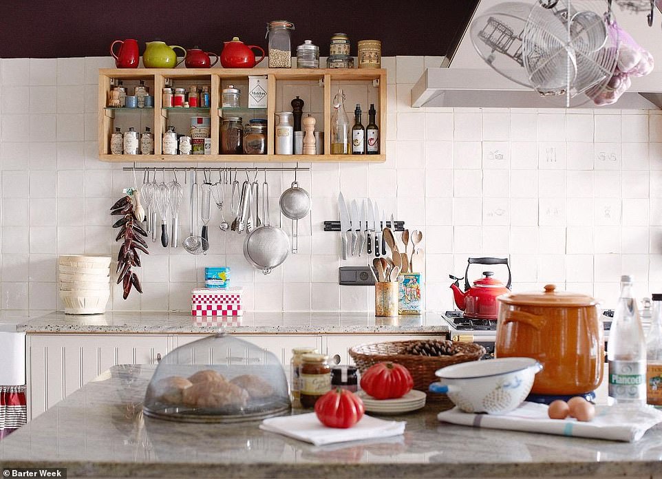 The impressive kitchen in La Maison Blanche aux Volets Bleus in Crédin, France. The owners would like guests who can teach them to make 'the best pizza in the world' instead of the usual price of around £150 per night 