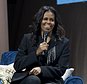 FILE - In this Nov. 17, 2018 file photo, former first lady Michelle Obama speaks to the crowd as she presents her anticipated memoir "Becoming" during her book tour stop in Washington. Crown Publishing tells The Associated Press on Wednesday that the former first lady's memoir has sold more than 1.4 million copies in all formats in the U.S. and Canada in the seven days since it was released Nov. 13. (AP Photo/Jose Luis Magana, File)