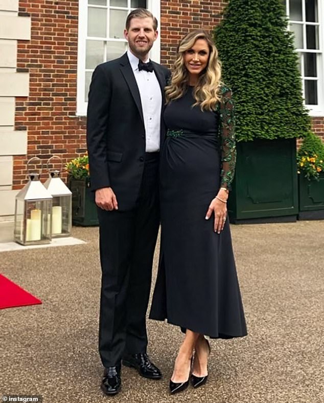 All dressed up: Pregnant Lara smiled next to her husband Eric in another photo