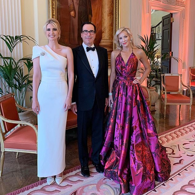 Her third picture showed her with the Treasury Secretary and his wife Louise Linton