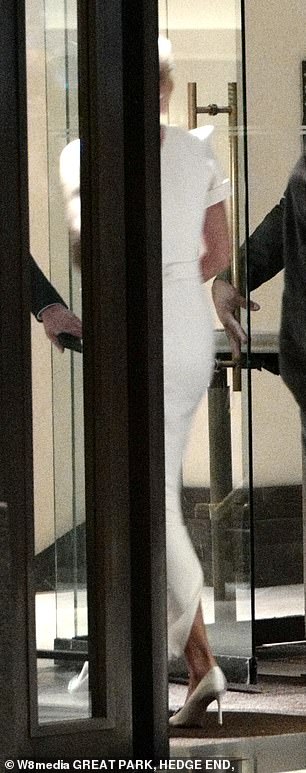 Ivanka, dressed in white, also headed back into the hotel where the family was staying